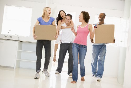 Removal team helping a Finchley household move boxes and furniture