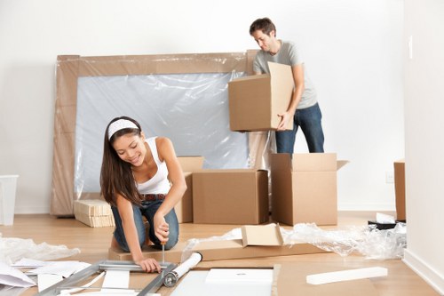 Moving van and boxes prepared for a home move in Finchley