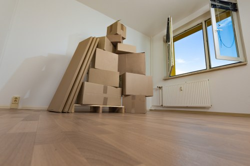 Furniture being carefully loaded for office removals in Finchley