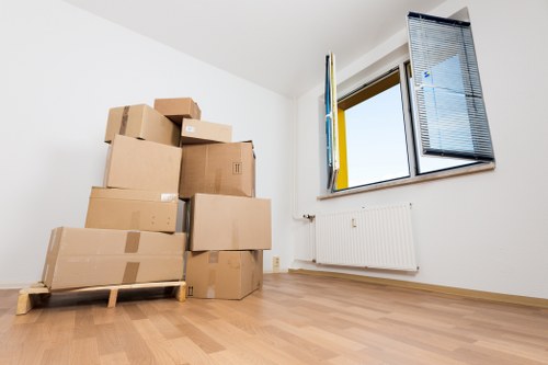 Packing boxes and household items prepared for a move in Finchley