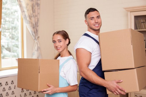 Careful wrapping and box labelling during a Finchley relocation