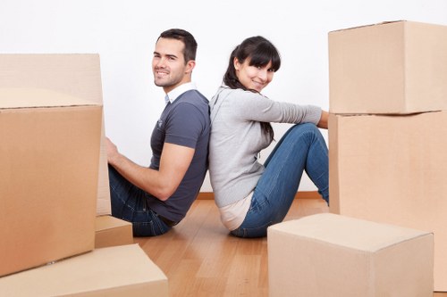 Local packing team organising boxes for a Finchley move